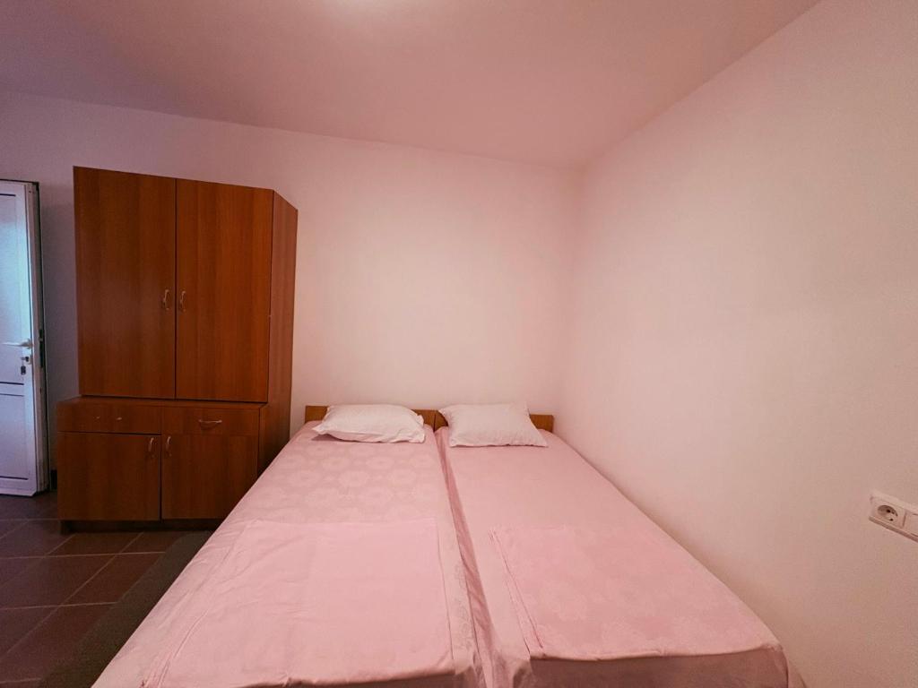 Letto o letti in una camera di Shkreli Apartments