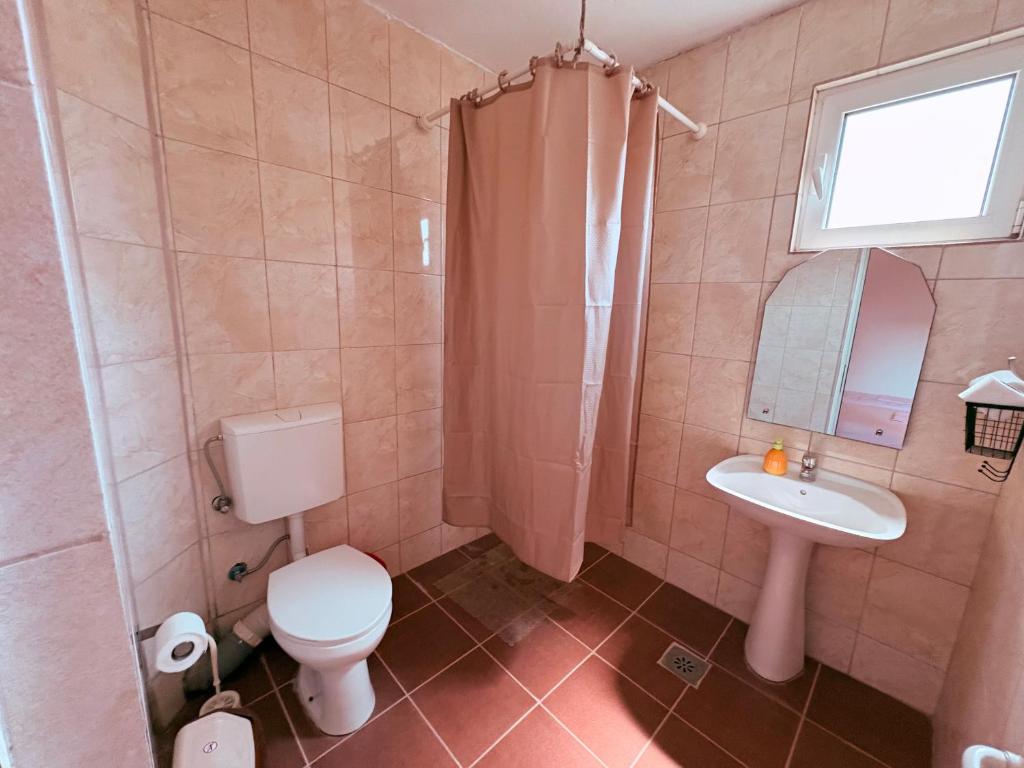 Bagno di Shkreli Apartments
