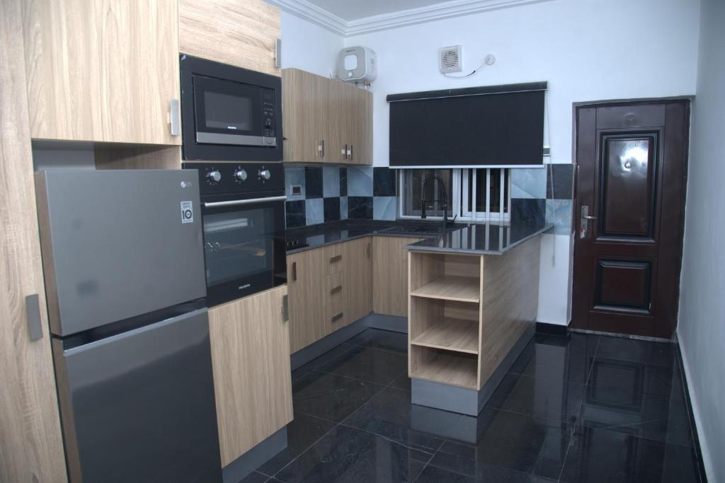 Kuchyň nebo kuchyňský kout v ubytování Kingston Luxury Apartments
