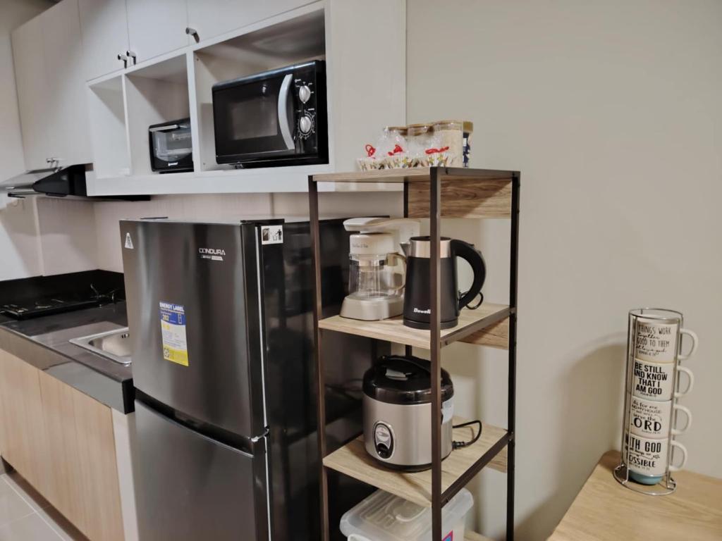 Η κουζίνα ή μικρή κουζίνα στο 2BR Condo SMDC Charm Metro Manila