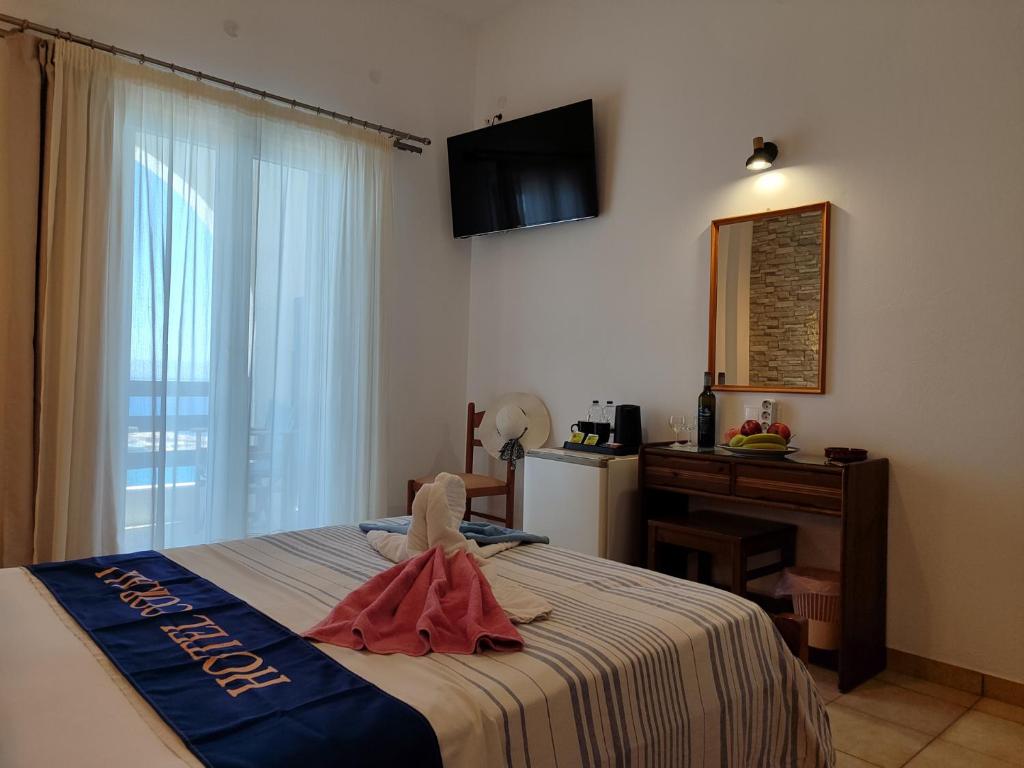 Postel nebo postele na pokoji v ubytování Corali Hotel