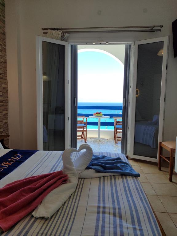 Postel nebo postele na pokoji v ubytování Corali Hotel