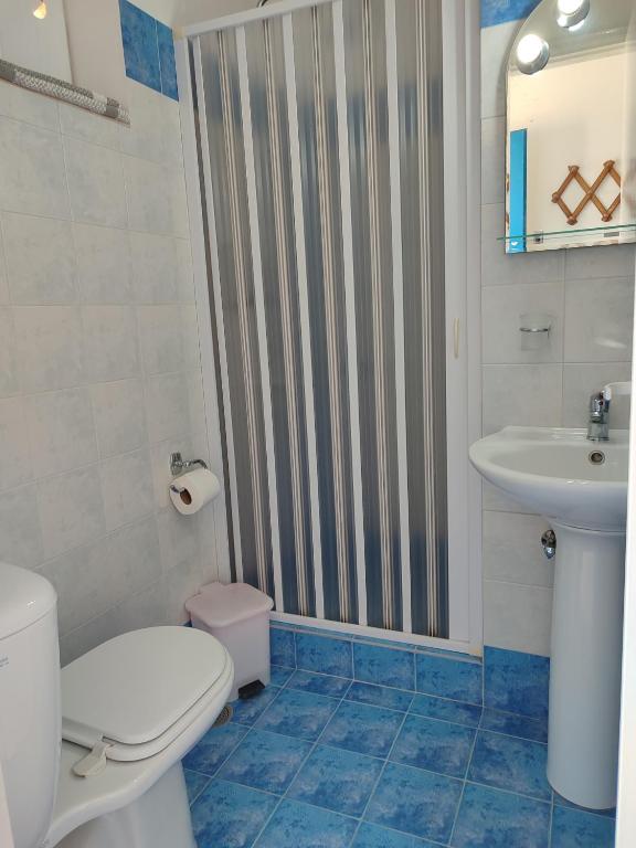 Koupelna v ubytování Corali Hotel