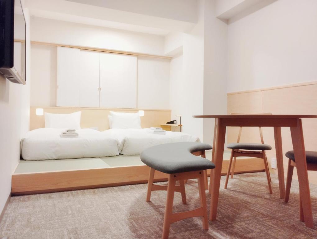 Χώρος καθιστικού στο Apartment Hotel DIG the OSAKA