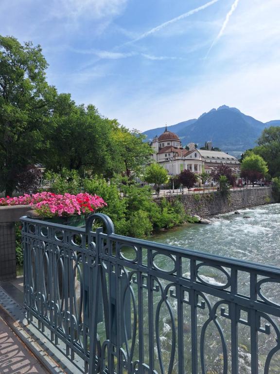 a view of a river from a bridge at Merano appartamento in Merano