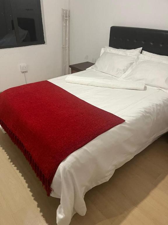 Postel nebo postele na pokoji v ubytování Capricorn Guest House