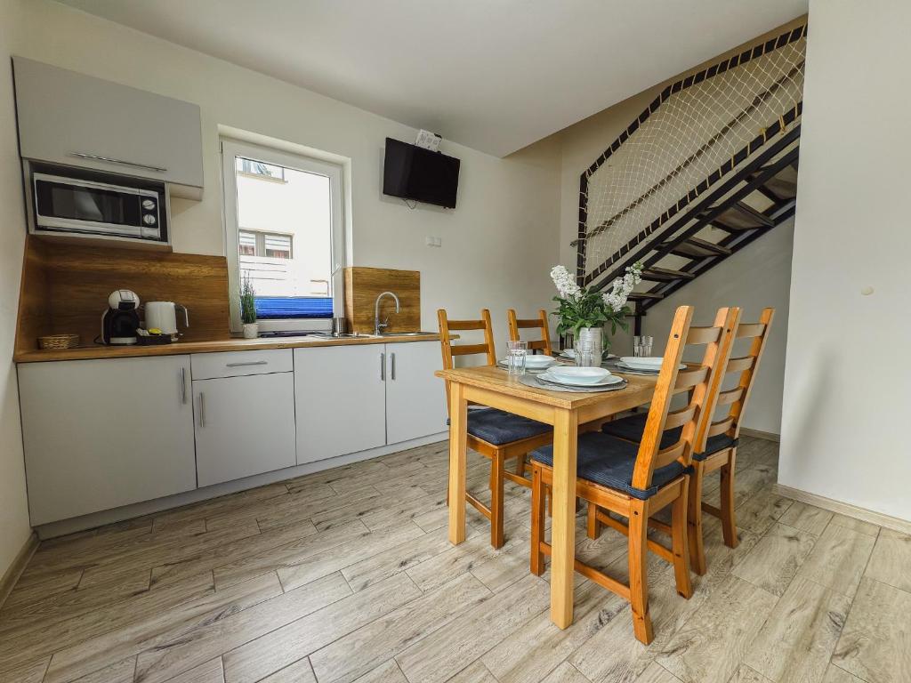 Kuchyňa alebo kuchynka v ubytovaní Rellim Apartamenty