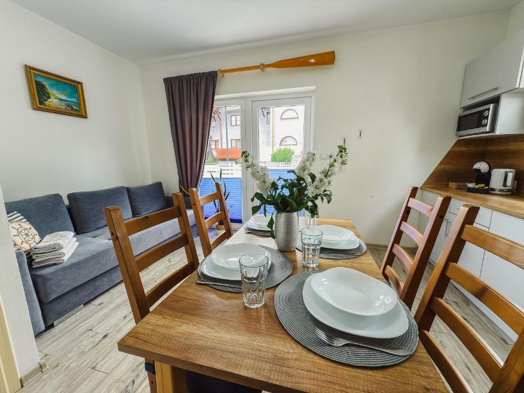 Posedenie v ubytovaní Rellim Apartamenty