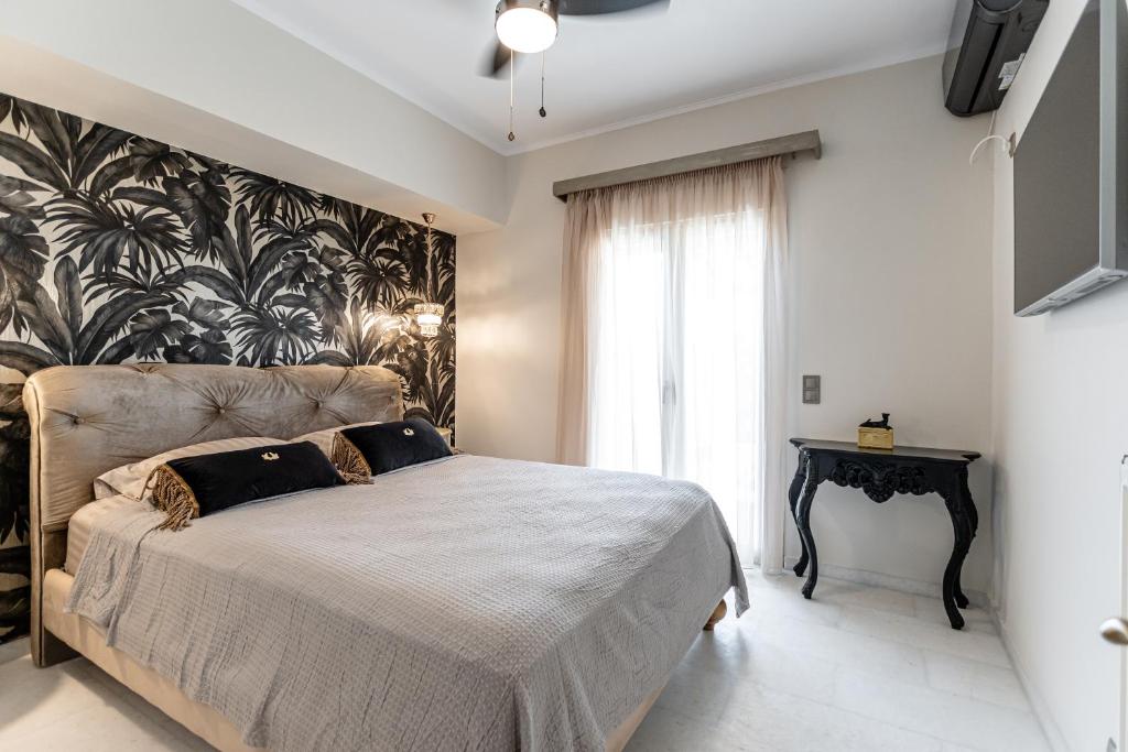 Voodi või voodid majutusasutuse Mythodea Luxury Villa toas