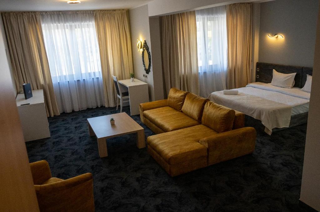 Postel nebo postele na pokoji v ubytování Black Tulip Hotel