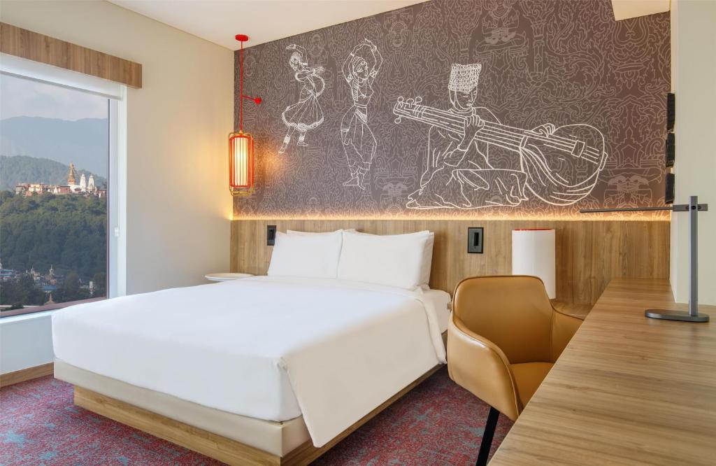 Voodi või voodid majutusasutuse Hyatt Centric Soalteemode Kathmandu toas