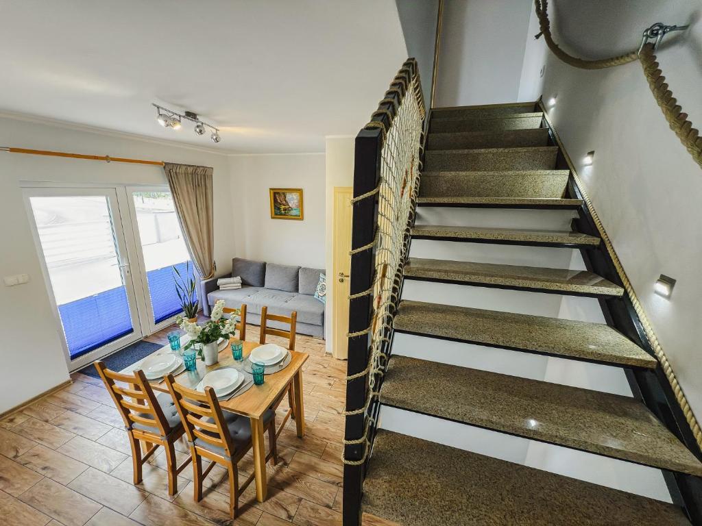 Posedenie v ubytovaní Rellim Apartamenty