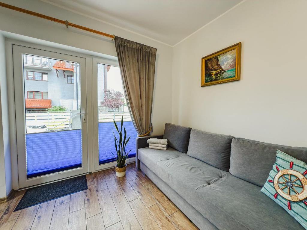 Posedenie v ubytovaní Rellim Apartamenty