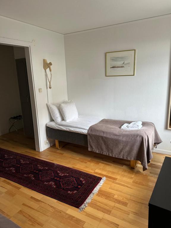 Postel nebo postele na pokoji v ubytování Värdshuset Hwitan