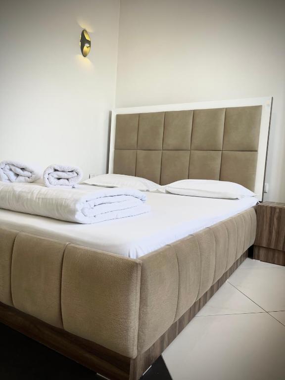 Postel nebo postele na pokoji v ubytování Hotel Heimli