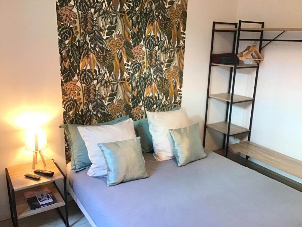Ένα ή περισσότερα κρεβάτια σε δωμάτιο στο Chambre Cosy 1