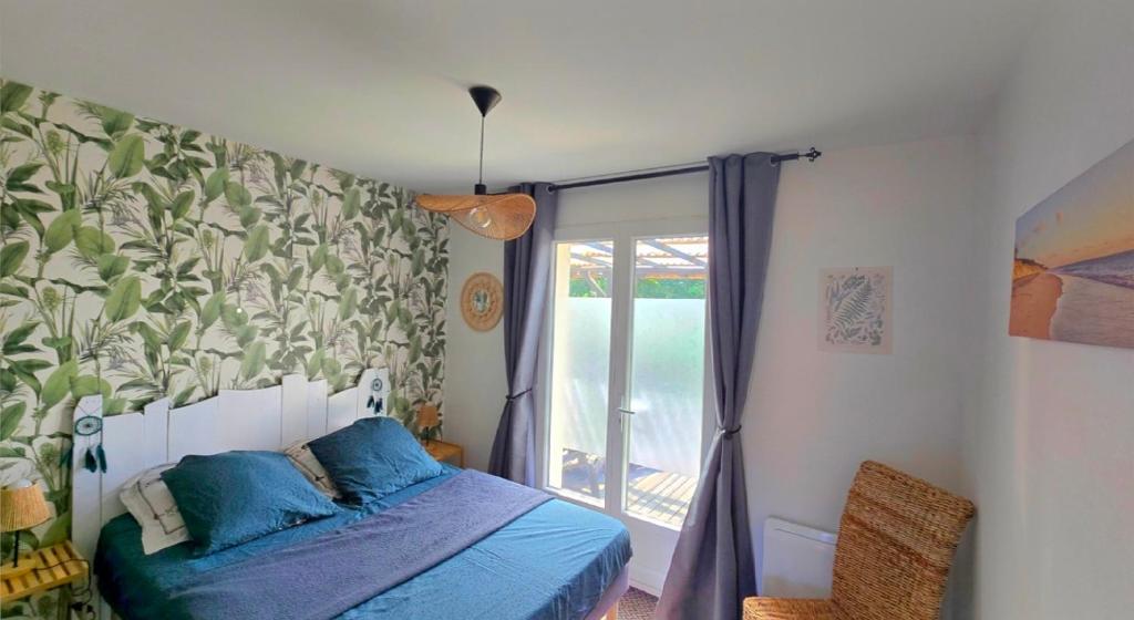 Postel nebo postele na pokoji v ubytování EntreLac&Océan3 - entrée et terrasse privée