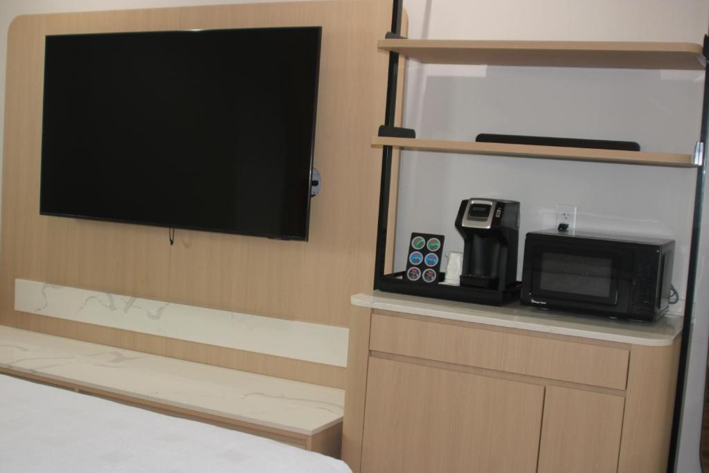 Postel nebo postele na pokoji v ubytování Hotel Lydia