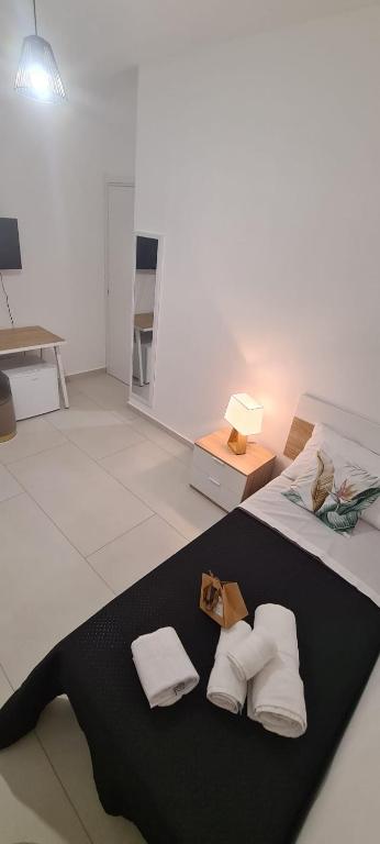 Letto o letti in una camera di Tropical House