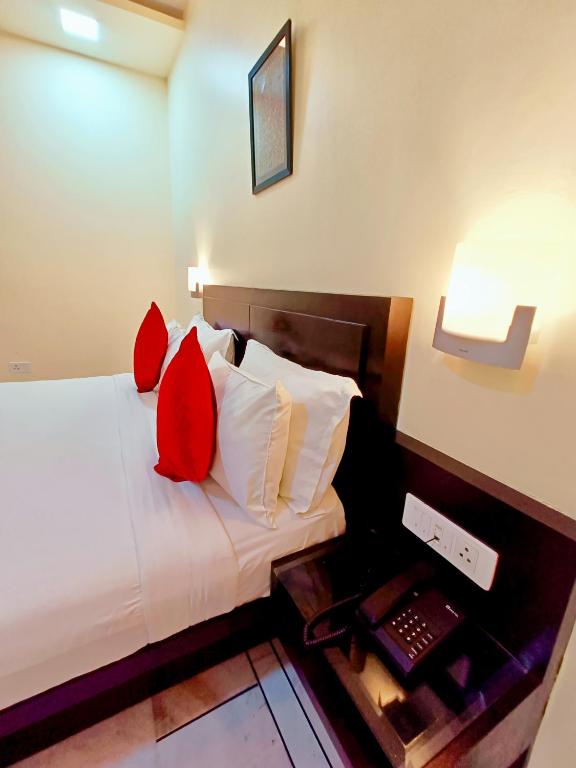 Postel nebo postele na pokoji v ubytování Hotel Sun Grand