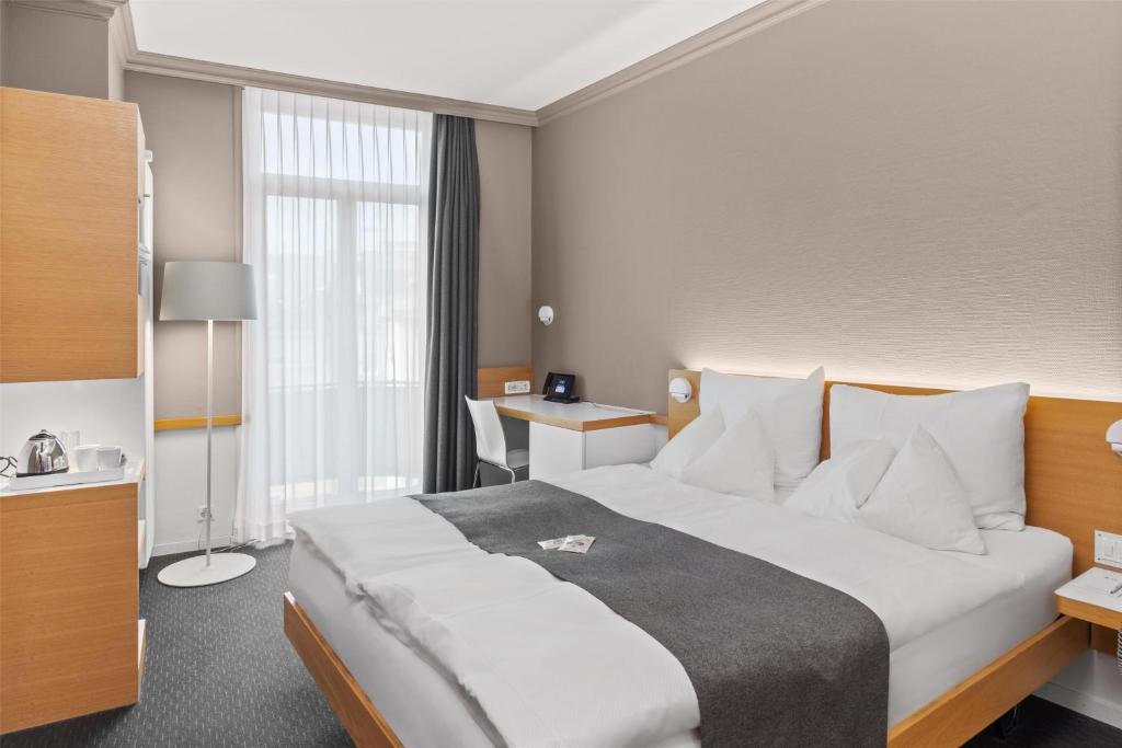 Katil atau katil-katil dalam bilik di Best Western Plus Hotel Zürcherhof