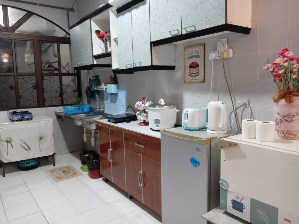 Η κουζίνα ή μικρή κουζίνα στο CAMELIA HOLIDAY APARTMENT
