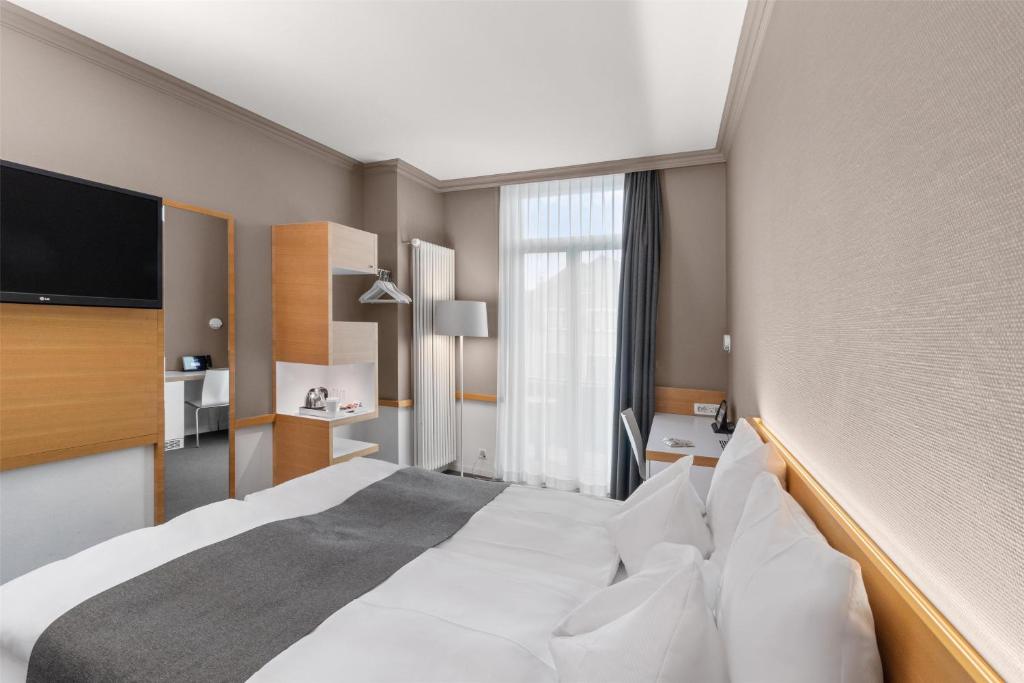 Katil atau katil-katil dalam bilik di Best Western Plus Hotel Zürcherhof