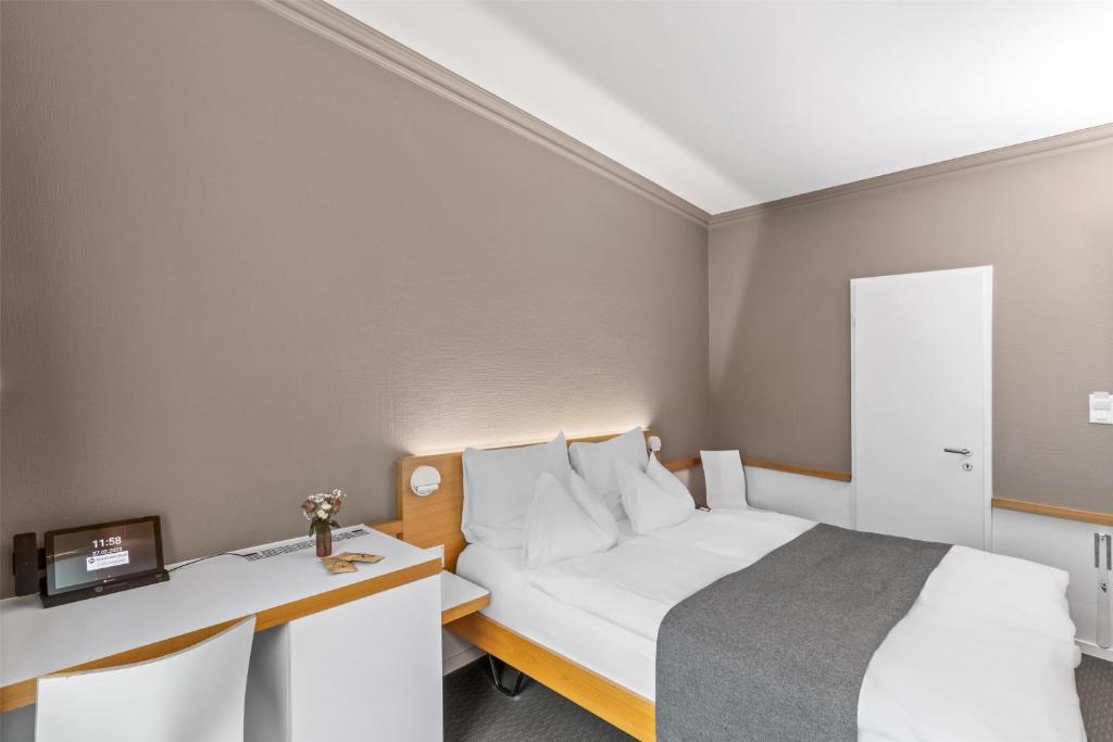 Katil atau katil-katil dalam bilik di Best Western Plus Hotel Zürcherhof