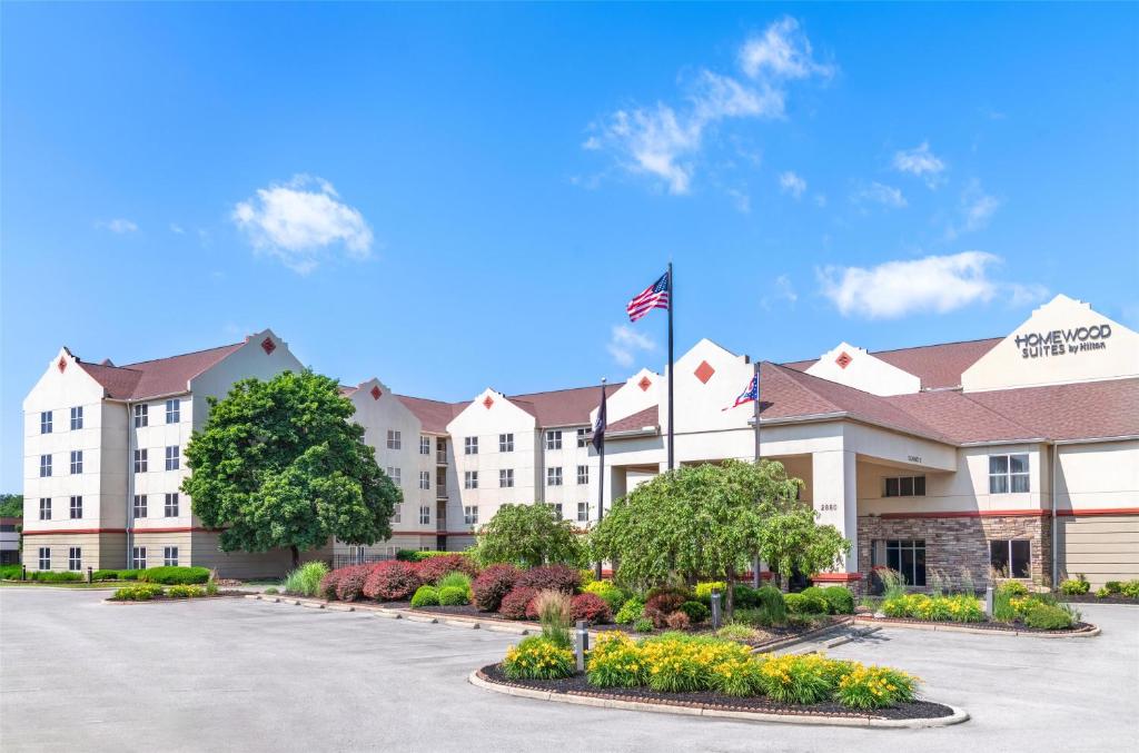a rendering of the front of a hotel at Homewood Suites Columbus - Airport in Columbus