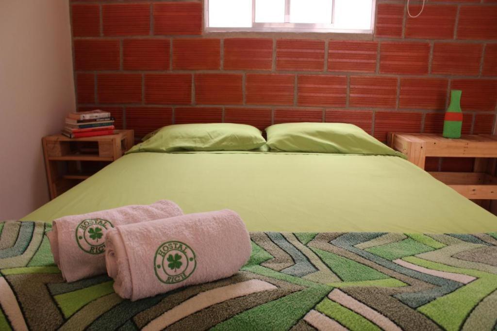 Postel nebo postele na pokoji v ubytování Hostal paz y vida