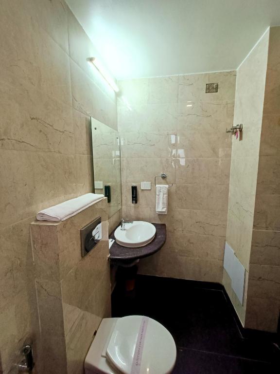 Koupelna v ubytování Hotel Sun Grand