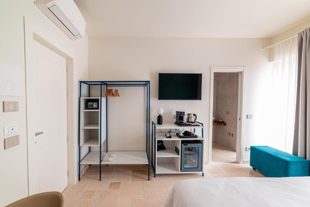 TV a/nebo společenská místnost v ubytování Suites Dimora Garibaldi