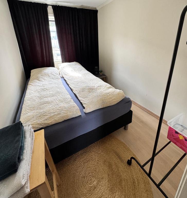 Postel nebo postele na pokoji v ubytování Buktarommet