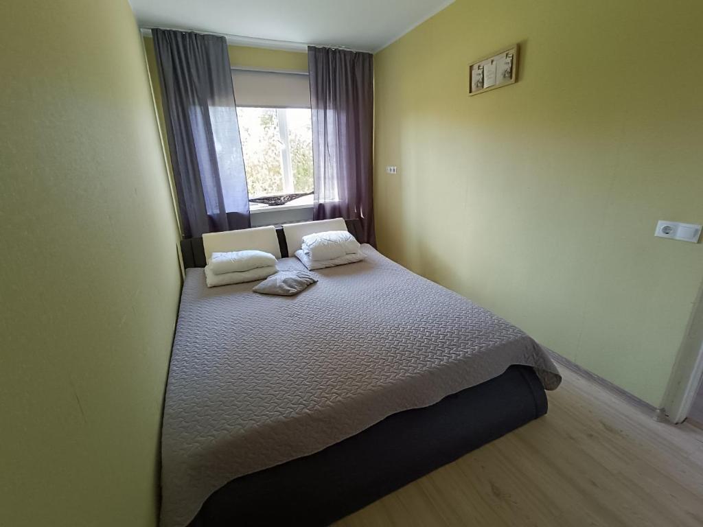 Postel nebo postele na pokoji v ubytování Rahu34