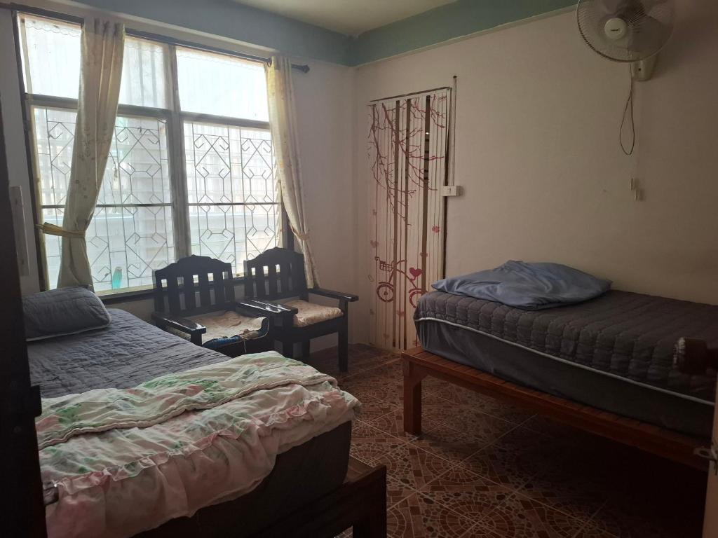 Postel nebo postele na pokoji v ubytování topp stay hostel