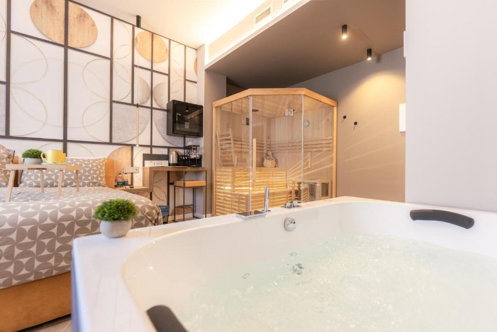 TV a/nebo společenská místnost v ubytování Boutique Casa Giulietta
