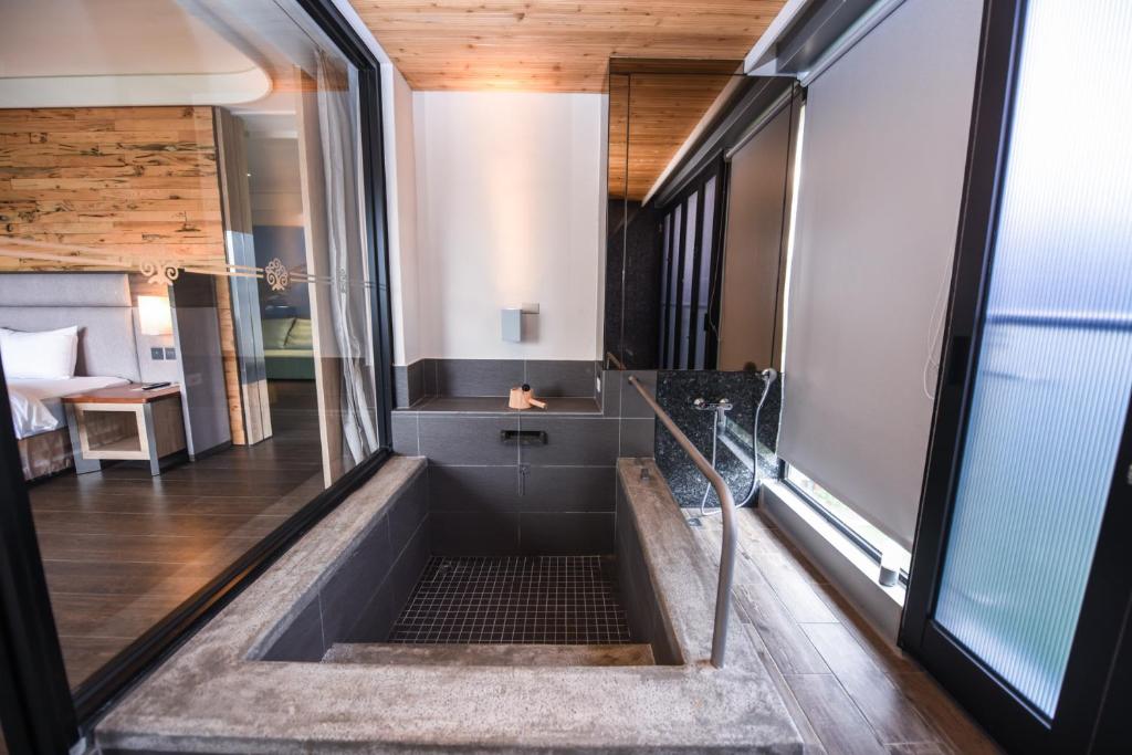 Postel nebo postele na pokoji v ubytování Chii Lih Resort