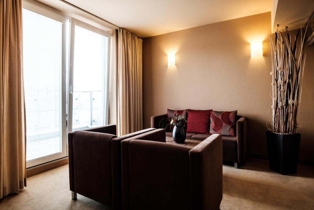 Posezení v ubytování Hotel Comfort with free Wellness and Fitness Centrum