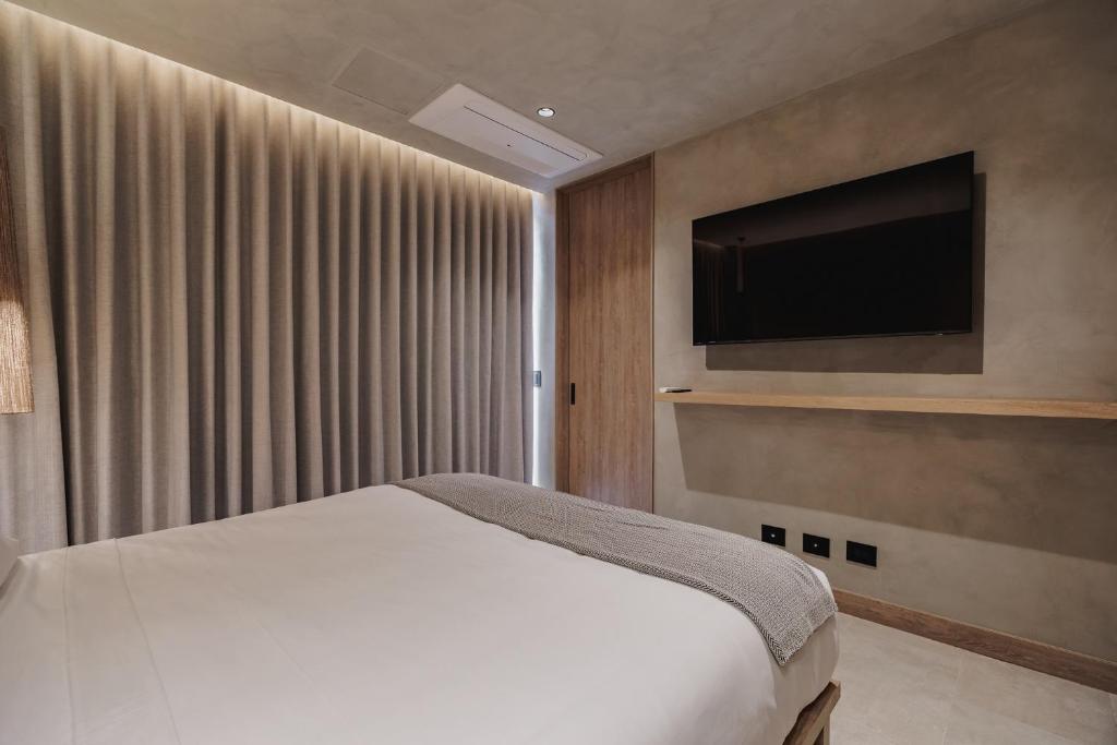 Postel nebo postele na pokoji v ubytování Kuuna Luxury Stays by Wynwood House