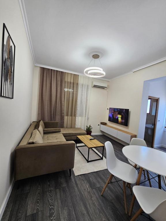 TV a/nebo společenská místnost v ubytování DION Apartment