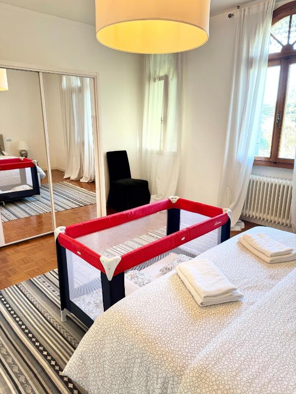 Postel nebo postele na pokoji v ubytování Casa del Vigneto
