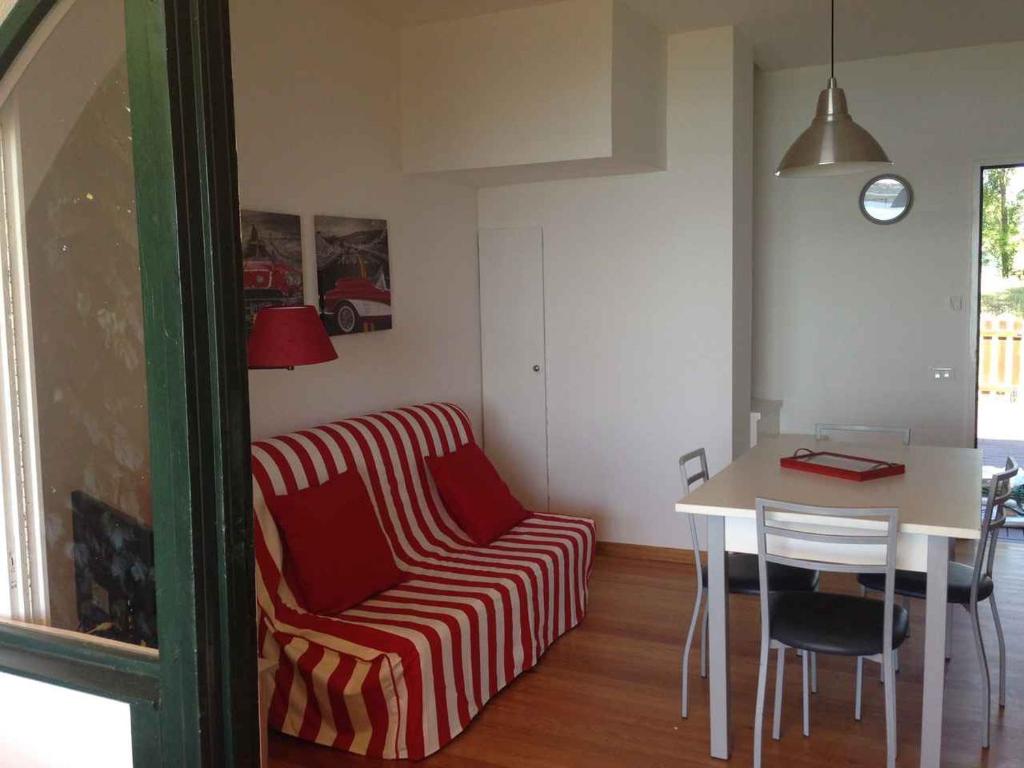 Ruang duduk di Holiday home in Isola di Albarella 53891