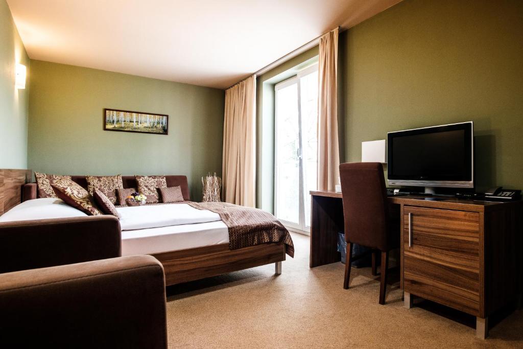 TV a/nebo společenská místnost v ubytování Hotel Comfort with free Wellness and Fitness Centrum