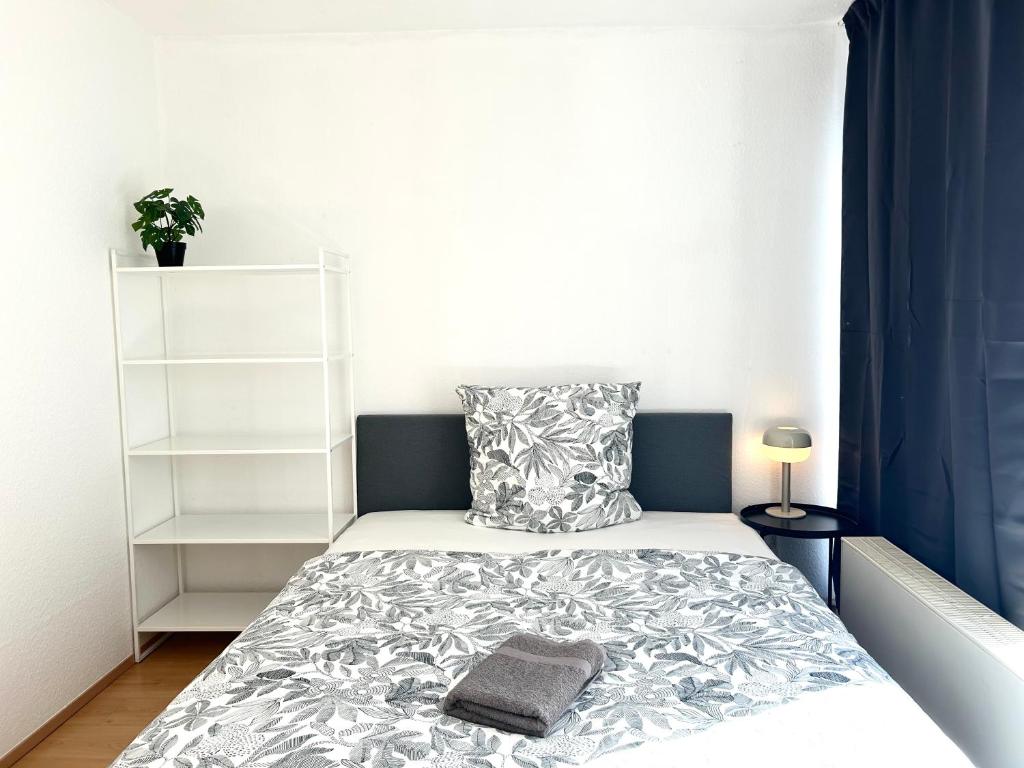 Postel nebo postele na pokoji v ubytování VIKTORIA RESIDENCE