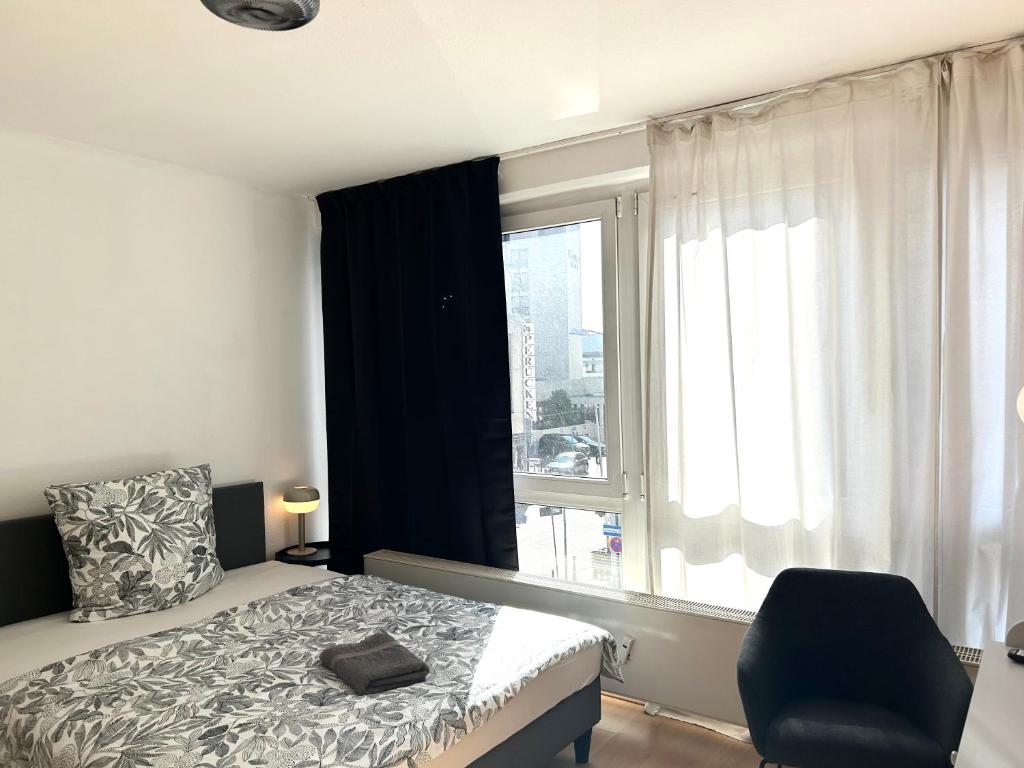 Postel nebo postele na pokoji v ubytování VIKTORIA RESIDENCE