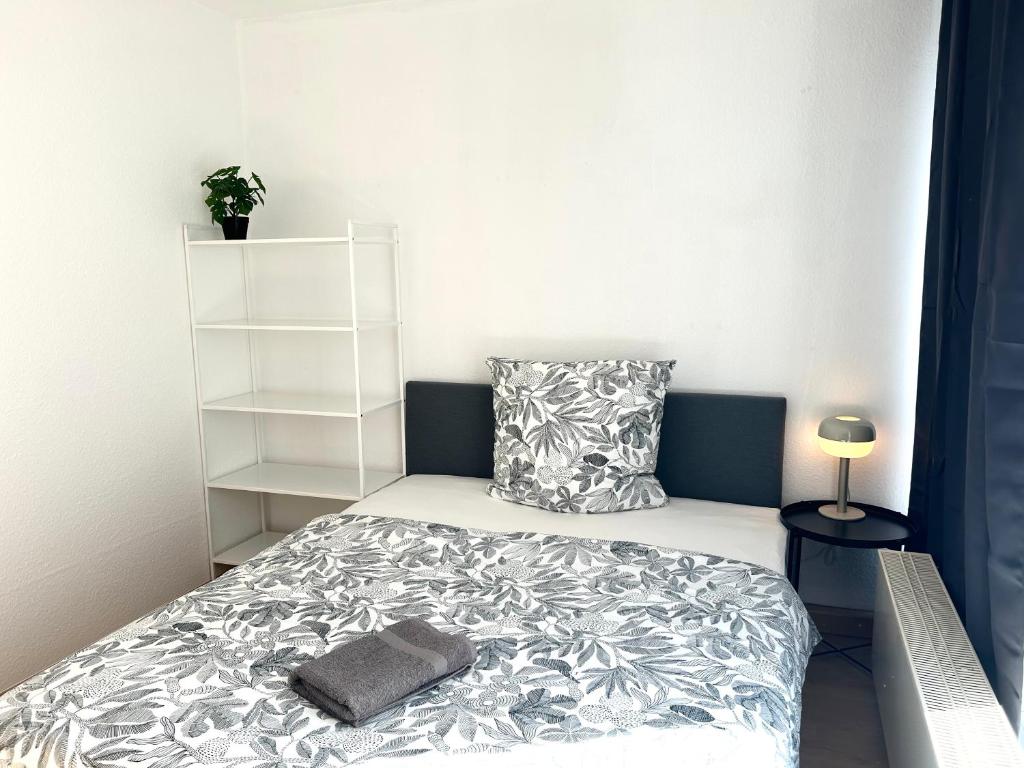 Postel nebo postele na pokoji v ubytování VIKTORIA RESIDENCE