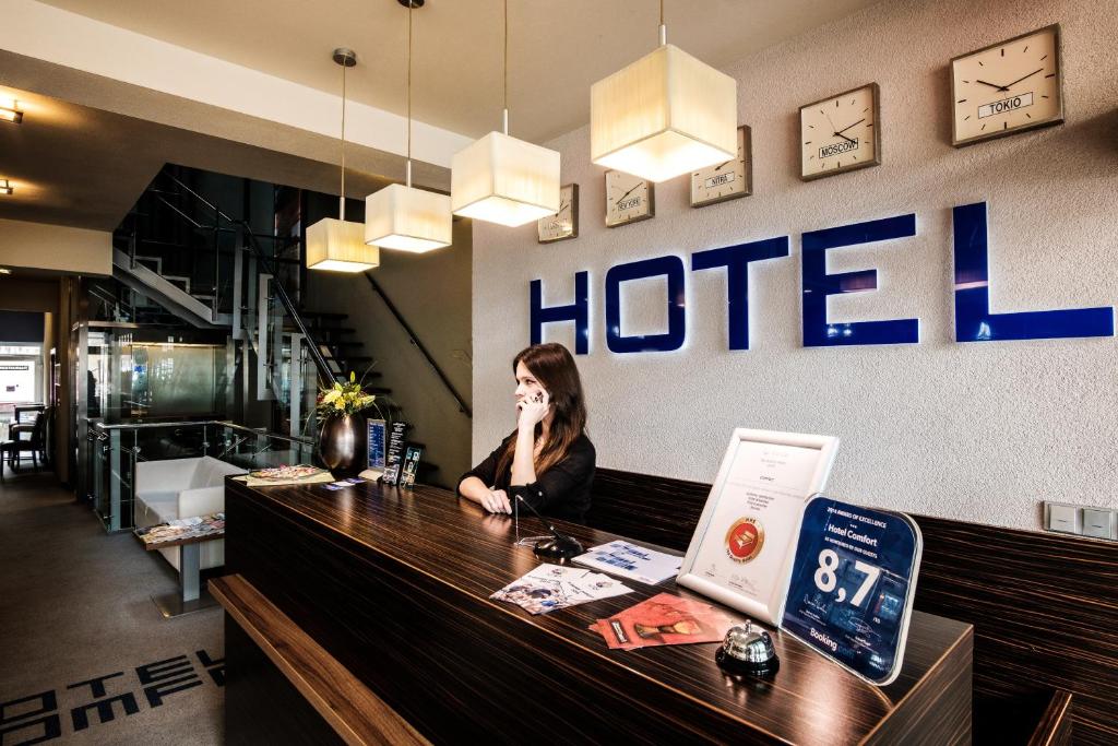 Členové personálu v ubytování Hotel Comfort with free Wellness and Fitness Centrum