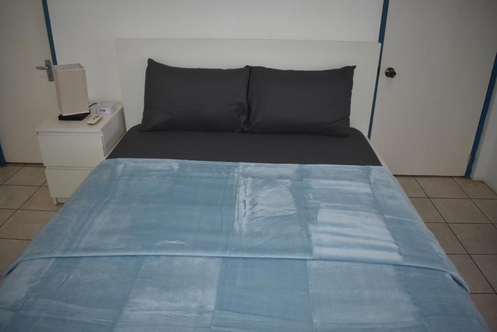 Postel nebo postele na pokoji v ubytování Villa Blue Vue