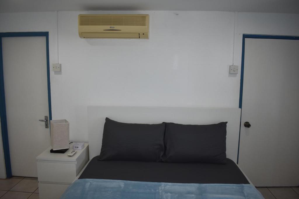 Postel nebo postele na pokoji v ubytování Villa Blue Vue
