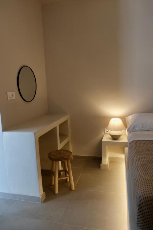 Postel nebo postele na pokoji v ubytování Cycladic Charm